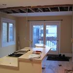 Start of demolition by removing center wall to open up the kitchen and maximize space