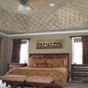 faux finish on the ceiling layered with a stencil motif